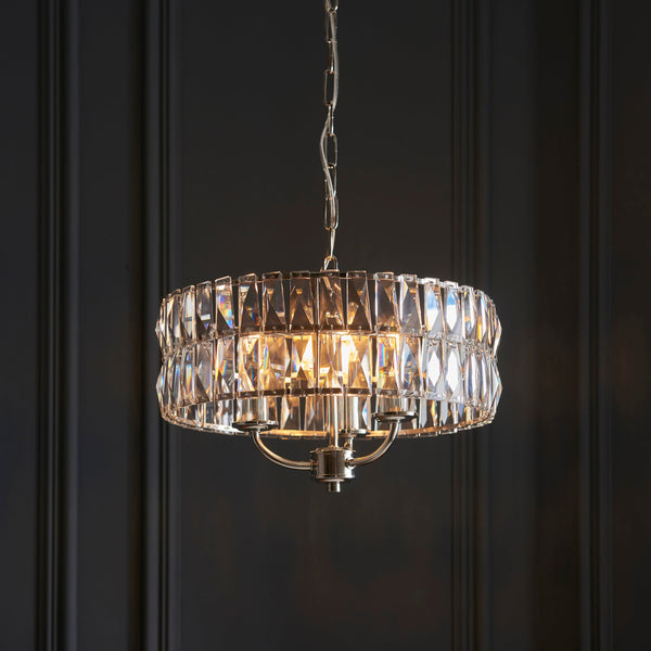 Endon Clifton 3-Light Pendant Drum Light Bright Nickel – A luxurious pendant light featuring clear faceted crystal glass and bright nickel metalwork. With three elegant lights, dimmable functionality, and an adjustable height, this statement fixture adds a touch of glamour to dining rooms, living rooms, and stylish interiors.
