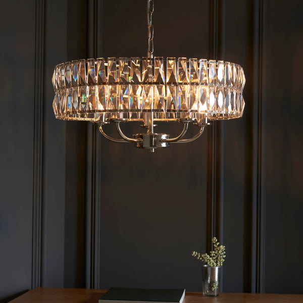 Endon Clifton 5-Light Pendant Drum Light Bright Nickel – A luxurious pendant light featuring clear faceted crystal glass and bright nickel-plated accents. Height-adjustable and dimmable, this elegant fixture casts a stunning light pattern, making it perfect for dining rooms, living spaces, and sophisticated interiors.