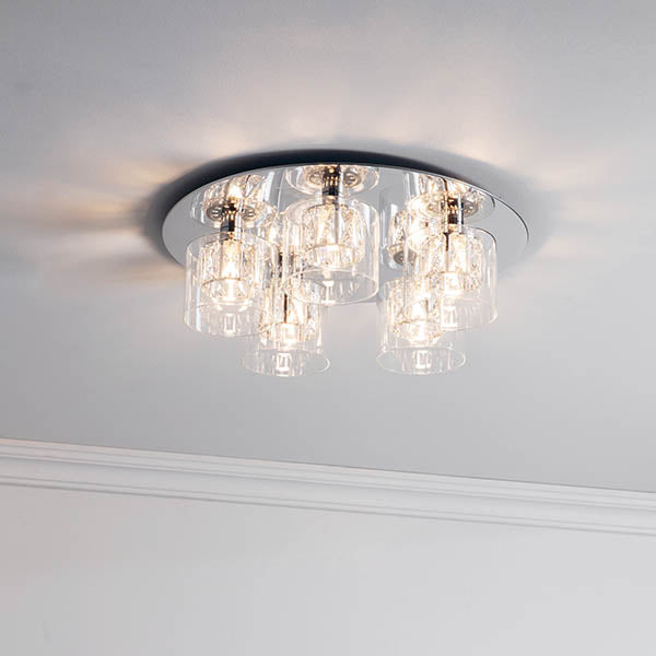 Endon Verina 5-Light Flush Ceiling Light Chrome – Elegant modern flush ceiling light with a polished chrome finish, faceted crystal accents, and clear glass diffusers. Designed for low ceilings, this luxury lighting fixture enhances living rooms, bedrooms, dining areas, and hallways. LED-compatible and easy to install. Perfect for contemporary and classic home interiors.