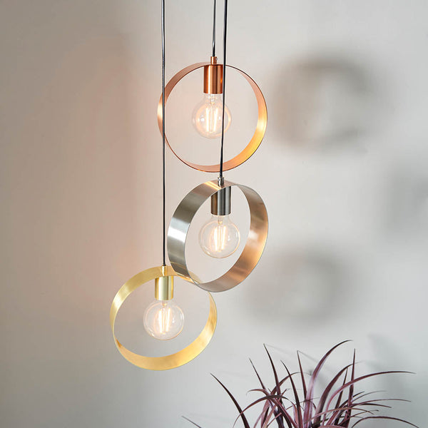 Endon 3 Light Multi Hoop Pendant Light in Brushed Brass features a sleek steel and brass design, dimmable functionality, and adjustable height, making it a stunning and versatile lighting solution for modern interiors.