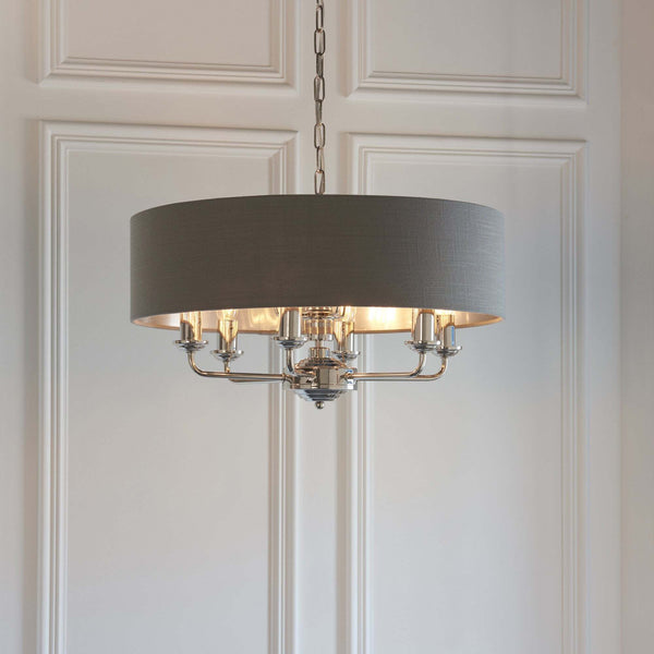 Endon Highclere 8-Light Pendant Drum Light Nickel Grey – A luxurious pendant light featuring a charcoal fabric drum shade, bright nickel metalwork, and an expansive 8-light design. With dimmable functionality and an adjustable drop, this elegant fixture is perfect for dining rooms, living rooms, and stylish interiors.