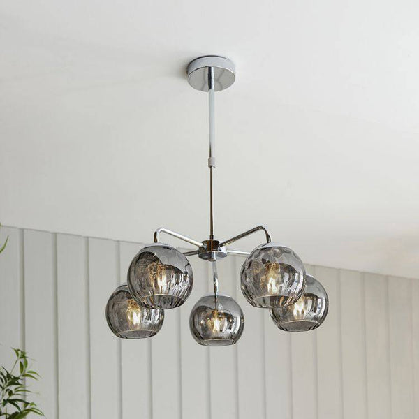 Endon Dimple 5-Light Rectangular Pendant Light in Chrome features smokey mirrored glass shades, polished chrome plating, and an adjustable drop, making it a sleek and sophisticated addition to modern interiors.