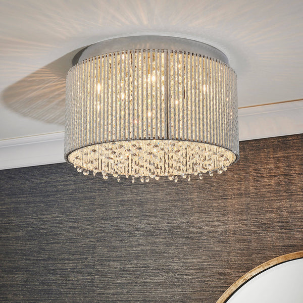 Endon Galina 10-Light Flush Ceiling Light Chrome – A sleek and modern ceiling fixture featuring a polished chrome finish, crystal glass accents, and durable steel construction. Designed for low ceilings, this luxurious flush light provides brilliant illumination with 10 G9 clear capsule bulbs. Perfect for contemporary living rooms, dining areas, bedrooms, and hallways.