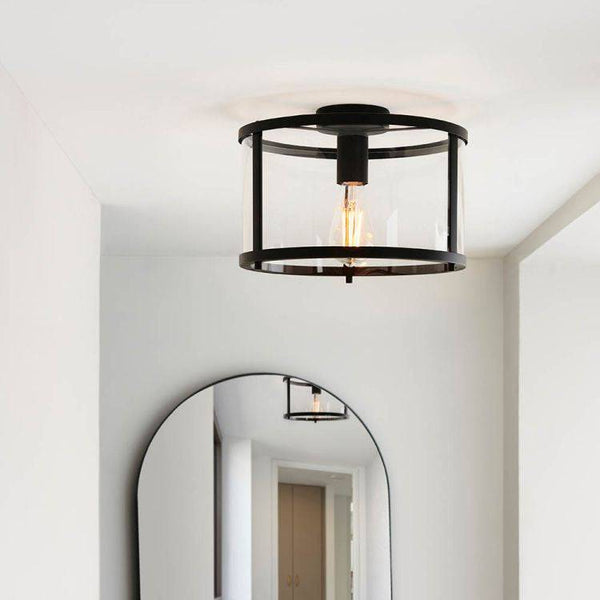 Endon Hopton Flush Ceiling Light Matt Black – A modern and sleek ceiling fixture featuring a refined matt black finish, sturdy steel and glass construction, and E27 GLS bulb compatibility. This dimmable flush light is perfect for low ceilings, offering adjustable illumination and sophisticated style to living rooms, dining areas, bedrooms, and hallways.