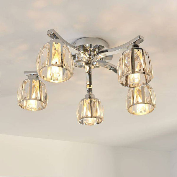 Endon Ria 5-Light Rectangular Pendant Light in Chrome features crystal glass accents, a polished chrome finish, and a sleek design, making it a stunning lighting solution for elegant interiors.