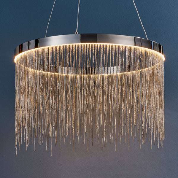 Endon Zelma Multi Hoop Pendant Light in Polished Chrome features a waterfall of delicate chains, an integrated LED ring, and height-adjustable clear cables, creating a floating, luxurious lighting effect for modern interiors.