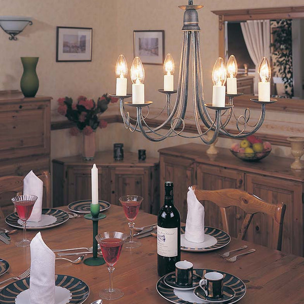 The Elstead Minster 6 light dual-mount rustic chandelier in black and gold is versatile and attractive. Made in England, and featuring pleasing looped drapes, is easily converted to a semi-flush mount and accepts optional glass shades