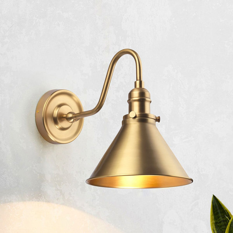 Elstead Provence 1 Light Wall Light in aged brass, inspired by mid-1900s French designs. Features an adjustable knuckle for directional lighting, vintage aesthetics, and durable steel construction.