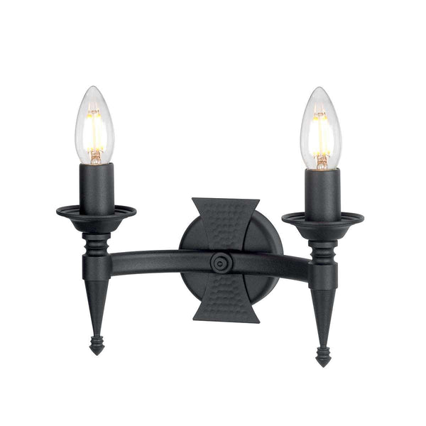 Elstead Saxon 2 Light Wall Light in black wrought iron, featuring decorative beaten metal panels for a medieval-inspired look. A perfect lighting solution for period and rustic interiors.