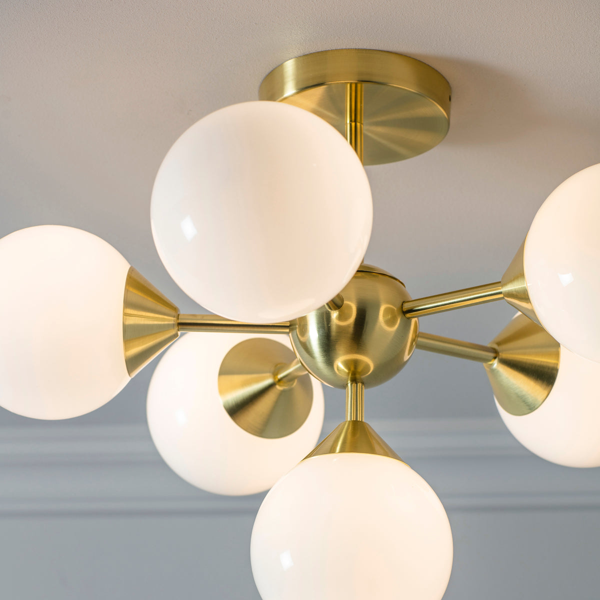 The Oscar 6 light Multi Arm Ceiling pendant light made by Endon lighting suitable for kitchen island lighting, living room, dining rooms and most rooms