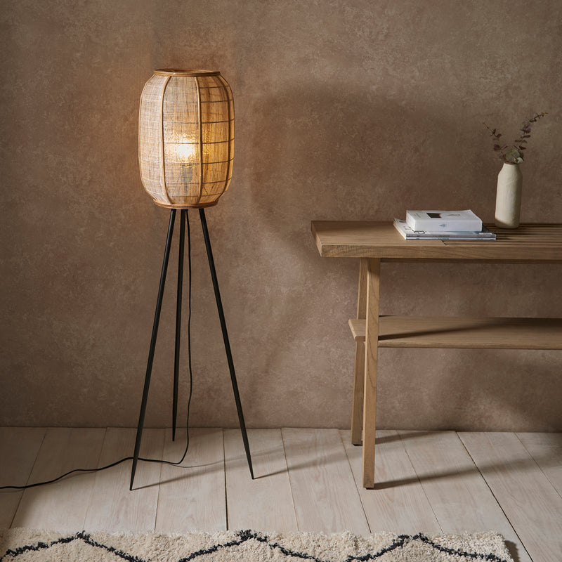 Endon Zaire Tripod Floor Lamp in natural linen and bamboo in a styled living room