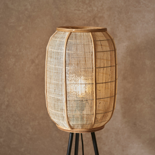 Detail of the natural linen and bamboo finish on the Zaire Tripod Floor Lamp