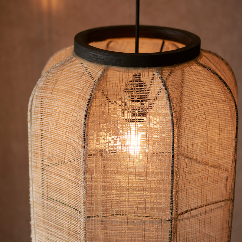 Detail of the natural linen and dark plywood finish on the Zaire Medium Pendant