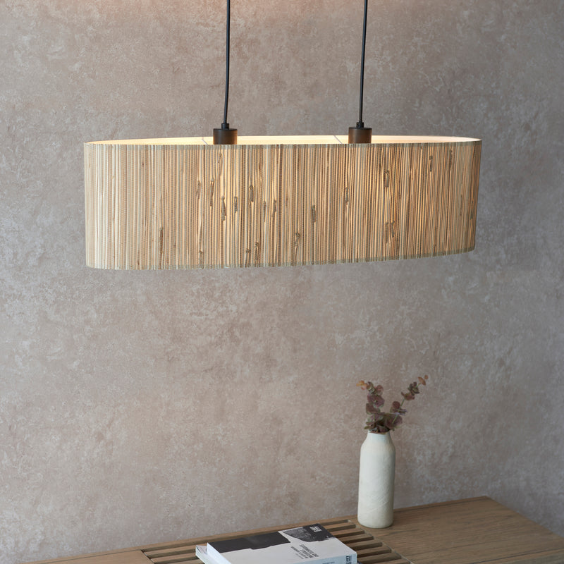 Detail of the natural seagrass and matt black finish on the Longshore 2 Light Linear Pendant