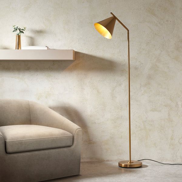 Endon Cape Task Floor Lamp in warm antique brass in a styled living room