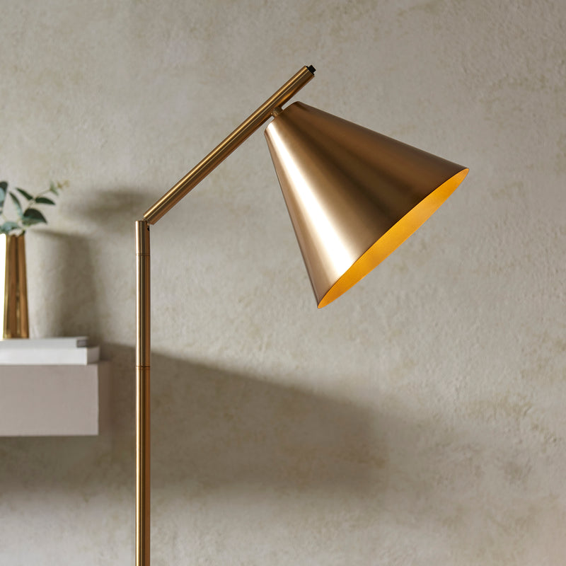 Detail of the warm antique brass finish on the Cape Task Floor Lamp