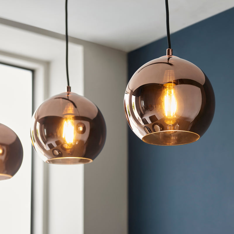 Close-up of the metalwork on the Boli 3 Light Linear Pendant