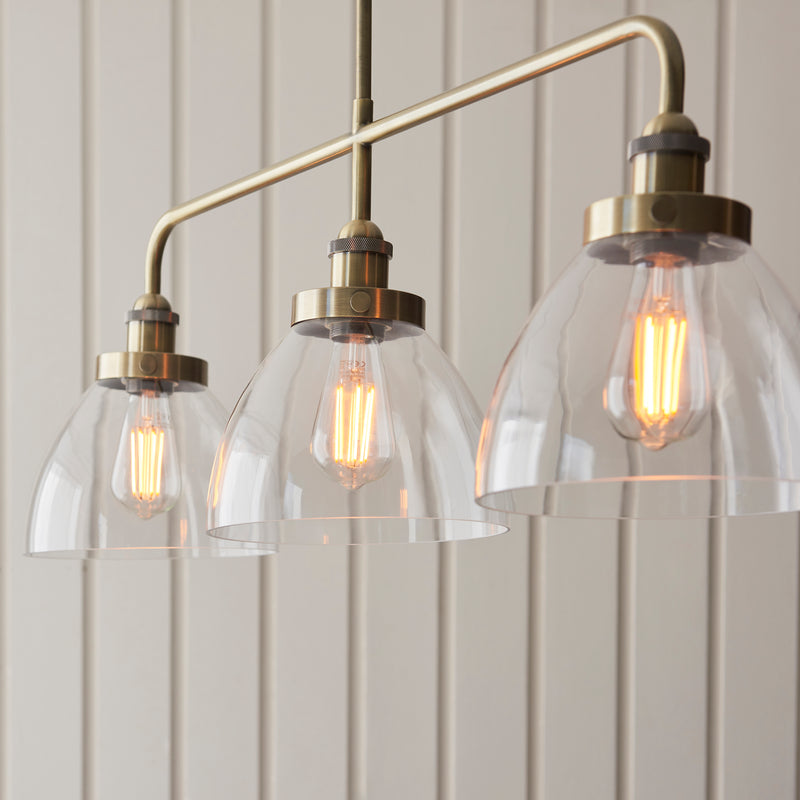 Close-up of the clear glass on the Hansen 3 Light Linear Bar Pendant