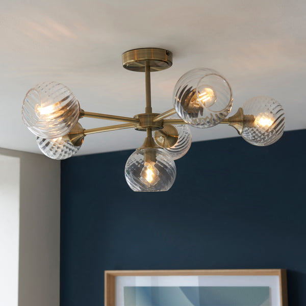 Allegra 6 Light Semi Flush Ceiling Light in antique brass on a living room ceiling