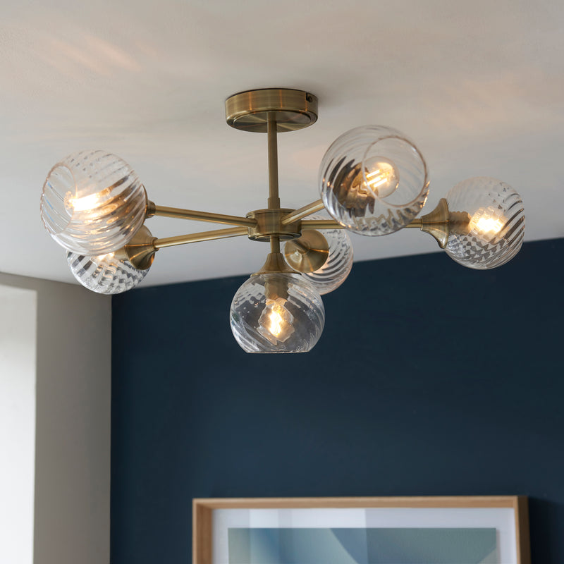 Allegra 6 Light Semi Flush Ceiling Light in antique brass on a living room ceiling
