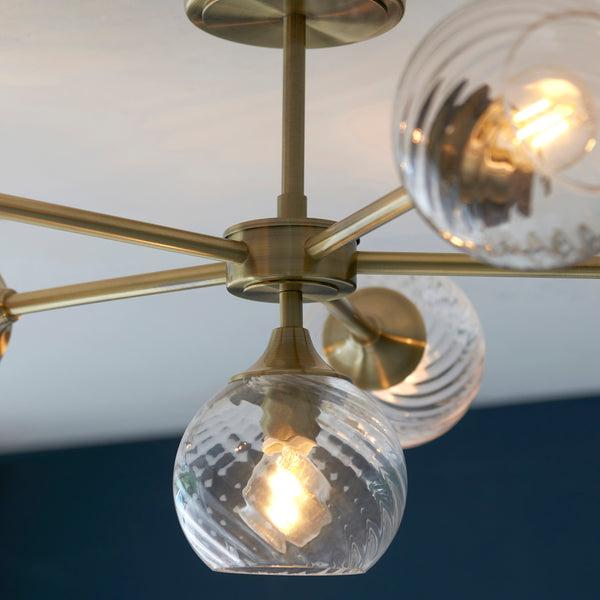 Close-up of the clear spiral glass on the Allegra 6 Light Semi Flush Ceiling Light