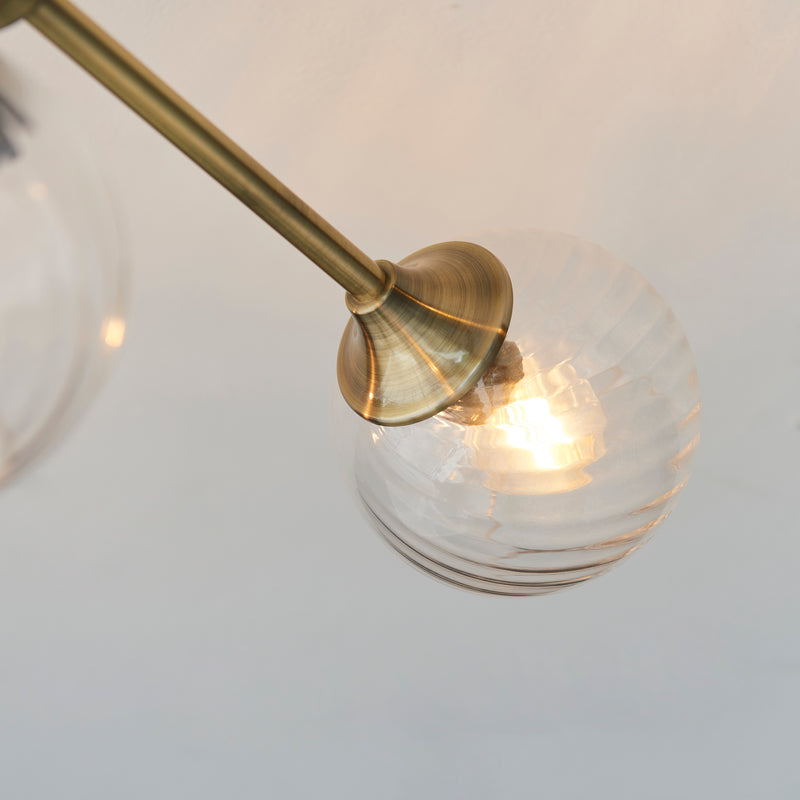 Close-up of the Allegra 6 Light Semi Flush Ceiling Light ceiling plate and fittings