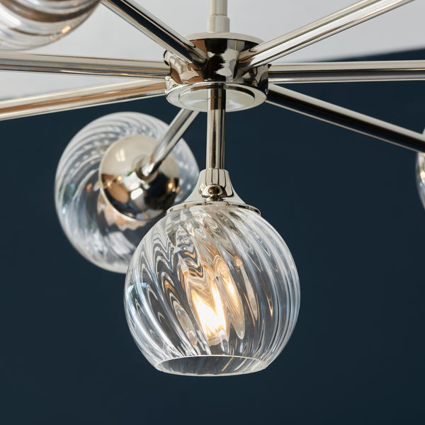 Allegra 8 Light Chandelier in bright nickel shown in a room setting