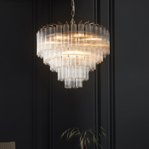 Toulouse 12 Light Tiered Chandelier in bright nickel shown in a room setting
