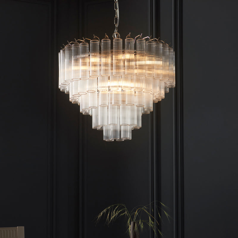 Toulouse 12 Light Tiered Chandelier in bright nickel shown in a room setting