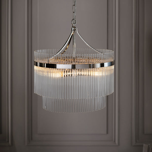 Marietta 5 Light Chandelier in bright nickel hanging in a living room