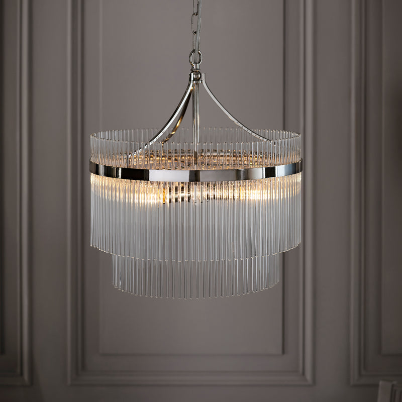 Marietta 5 Light Chandelier in bright nickel hanging in a living room