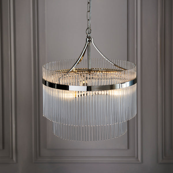 Marietta 3 Light Chandelier lit up in a styled bedroom