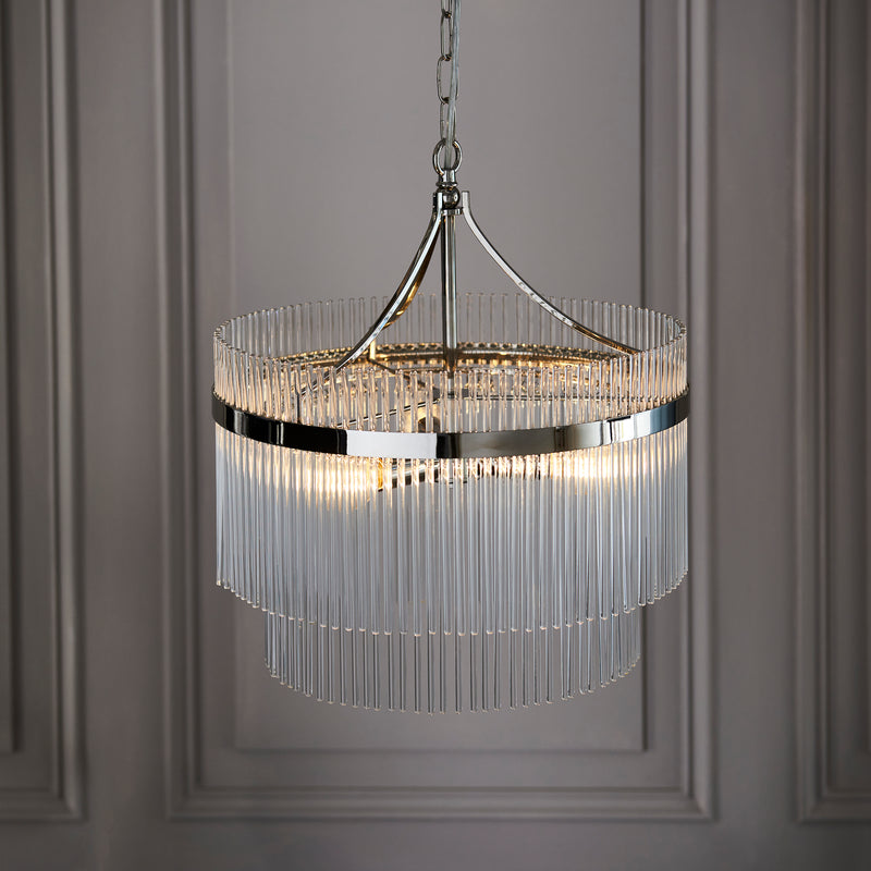 Marietta 3 Light Chandelier lit up in a styled bedroom