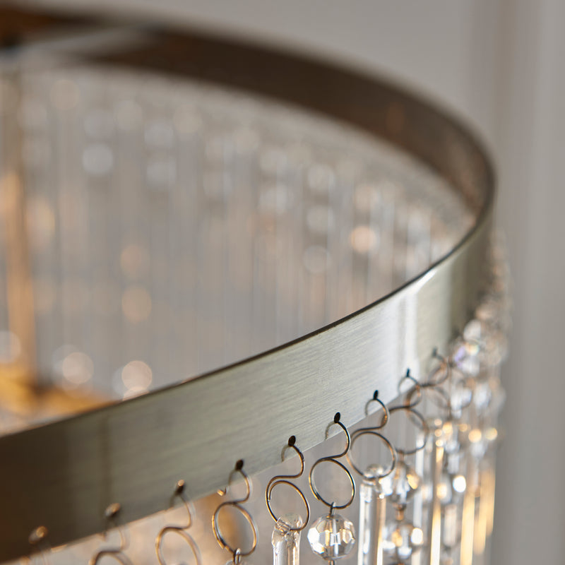 Detail of the antique brass finish on the Genevieve 5 Light Chandelier