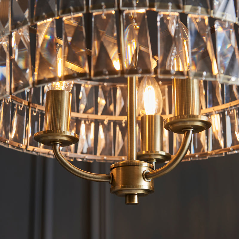 Detail of the antique brass finish on the Clifton 3 Light Pendant