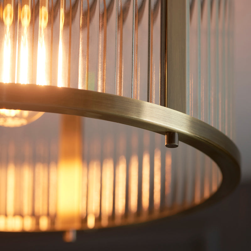 Detail of the antique brass finish on the Ridgeton Flush Ceiling Light