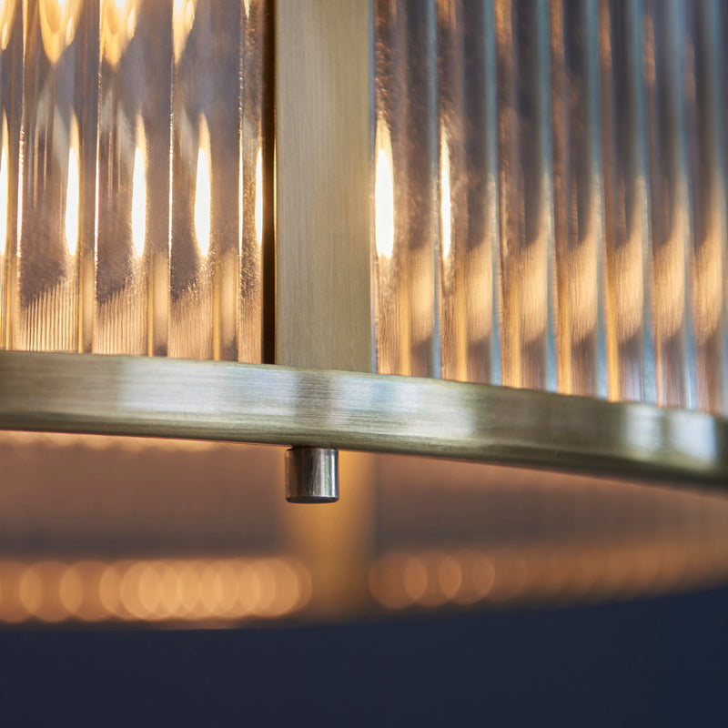 Detail of the antique brass finish on the Ridgeton 3 Light Pendant