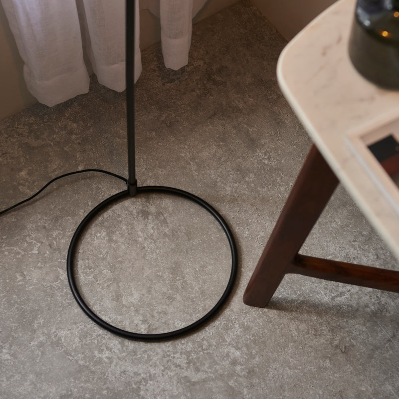 Detail of the matt black and antique brass finish on the Brair Task Floor Lamp