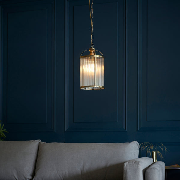 Lambeth Ribbed Lantern Pendant lit up in a styled hallway