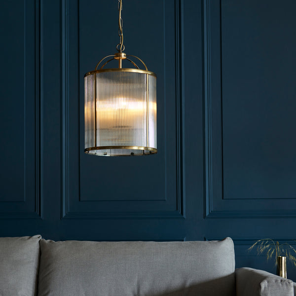 Lambeth Ribbed 4 Light Lantern Pendant lit up in a styled hallway
