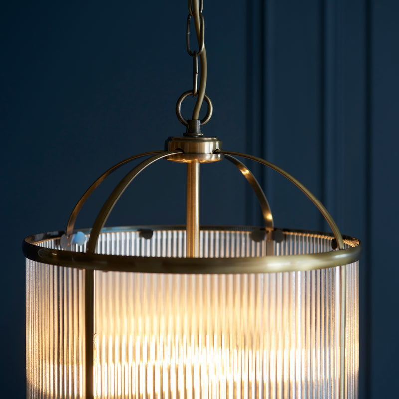 Detail of the antique brass finish on the Lambeth Ribbed 4 Light Lantern Pendant