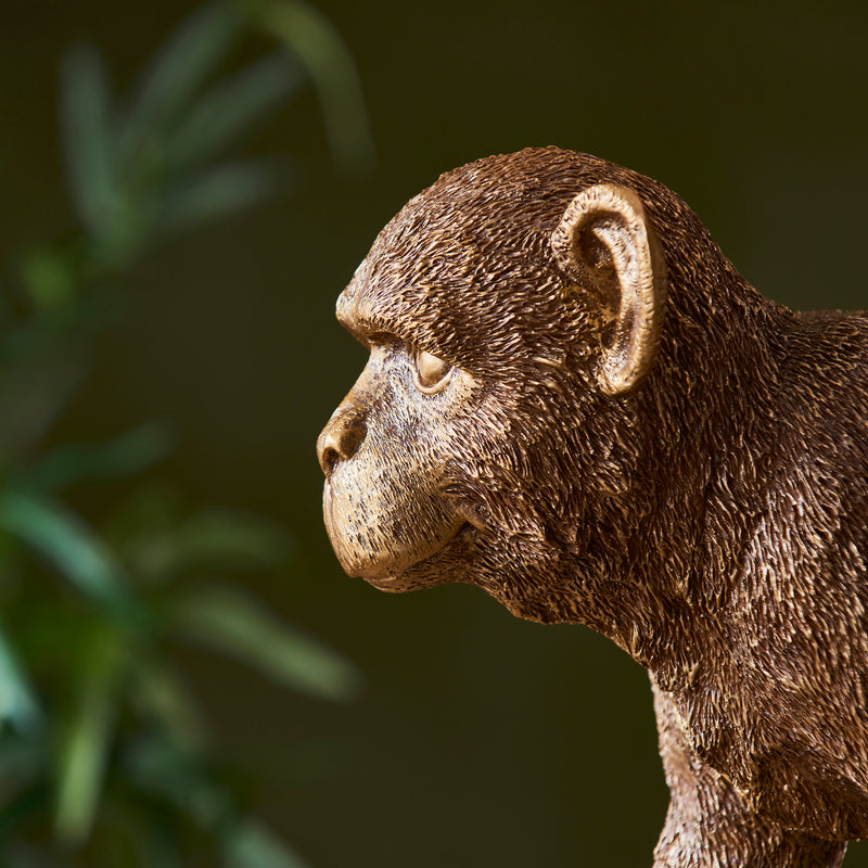 Detail of the vintage gold finish on the Capuchin Monkey Table Lamp