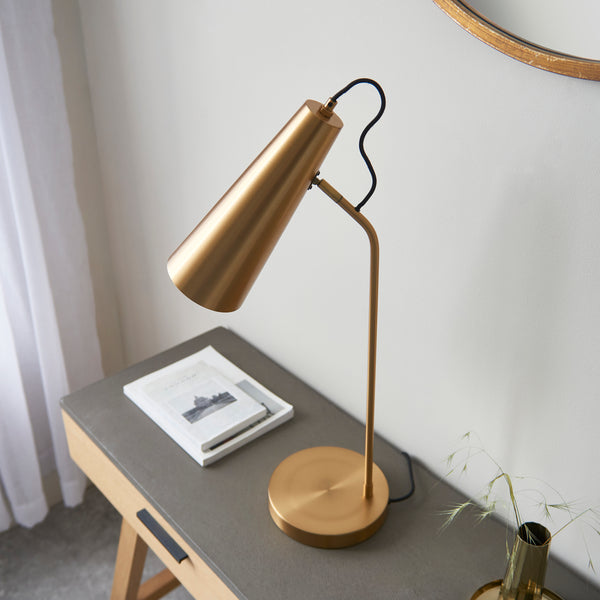 Detail of the warm antique brass finish on the Karna Task Table Lamp