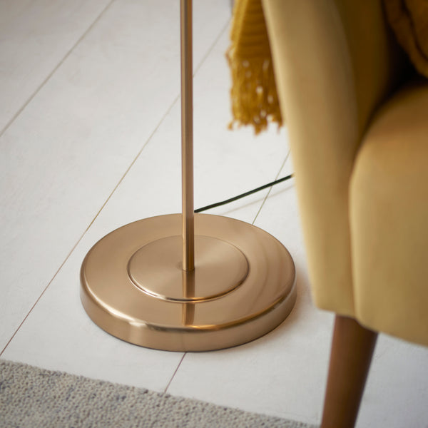 Detail of the brushed aged brass finish on the Clement Floor Lamp