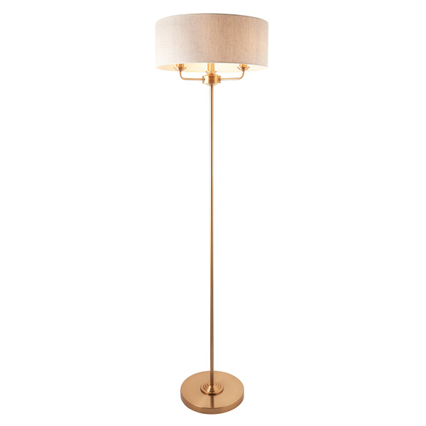 Endon Highclere 3 Light Floor Lamp in vintage brass and linen on a white background