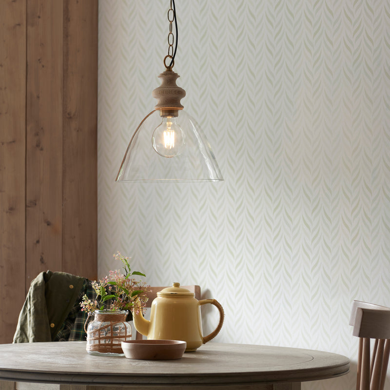 Cotswold Pendant in natural ash hanging in a kitchen