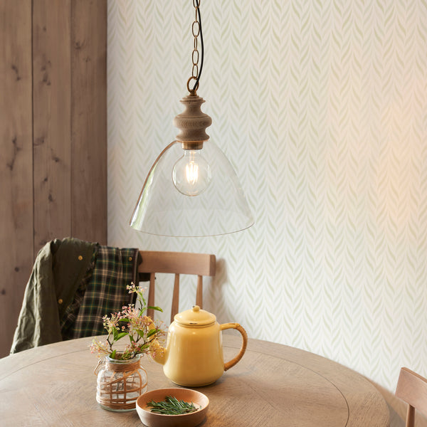 Cotswold Pendant lit up in a styled kitchen