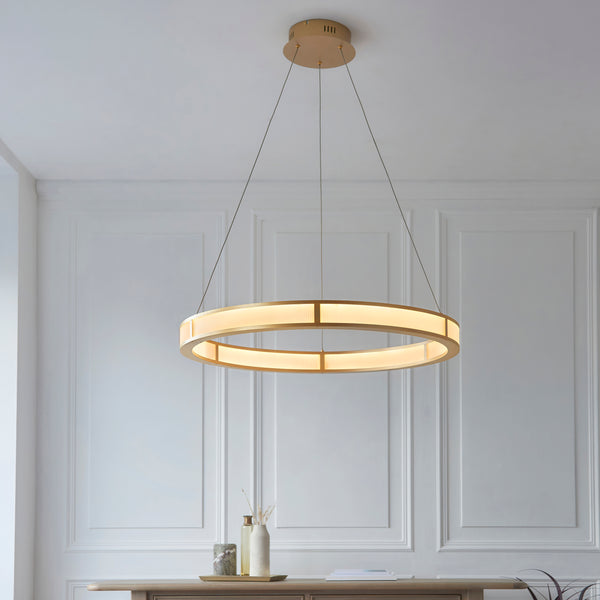 Classic Ribbed LED Hoop Pendant lit up in a styled living room