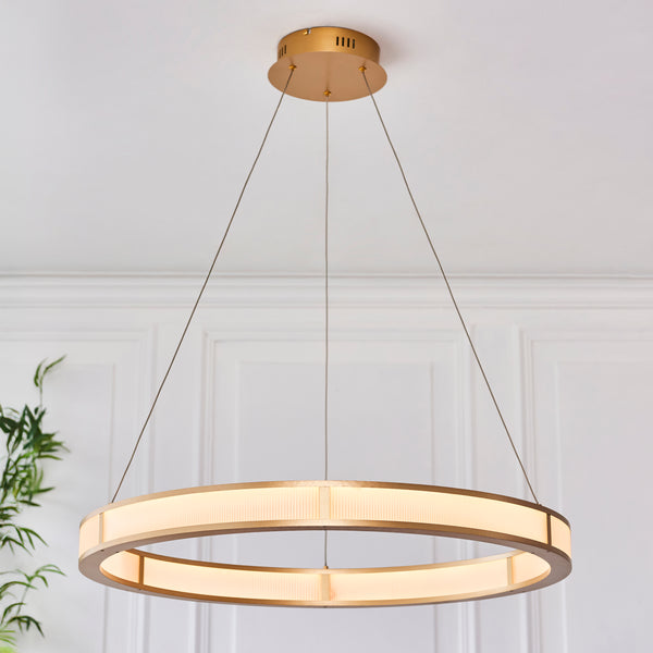 Classic Ribbed LED Hoop Pendant in brushed gold shown in a room setting