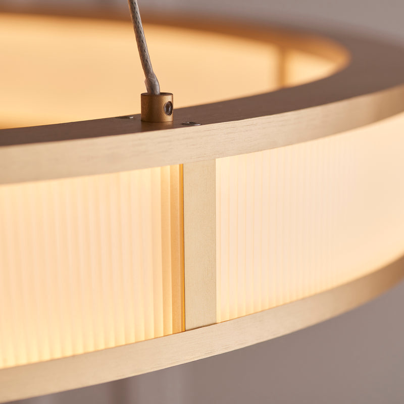 Detail of the brushed gold finish on the Classic Ribbed LED Hoop Pendant